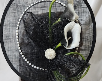 Elegant black fascinator with black and white calla lillies and pearls