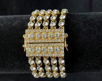 Spectacular 5 Strand Swarovski Rhinestone and Gold Tone Bracelet w/ Magnetic Rhinestone Clasp