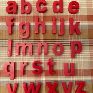 Solid red lowercase resin letter set and storage container