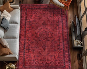 May include: A large rectangular area rug featuring a deep red base color with a dark charcoal black intricate floral and geometric pattern. The rug has a prominent central medallion design surrounded by a wide decorative border.