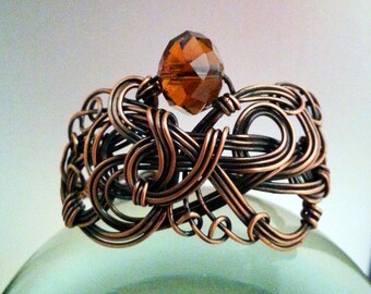 Wire Wrapped Copper Bracelet With Faceted Amber Glass Bead