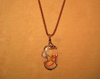Copper wire wrapped Art Glass Pendant With Gold, Pink, Blue, & Metallic Dichroic Glass