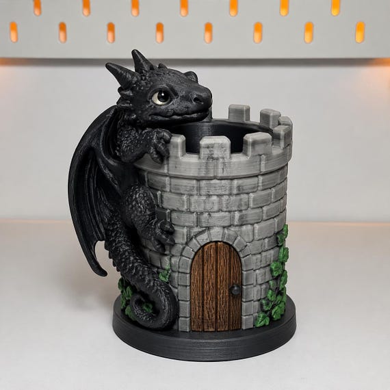 A hand-painted resin dragon castle that doubles as a pen holder — this is desk decor that looks like it escaped a fantasy RPG.