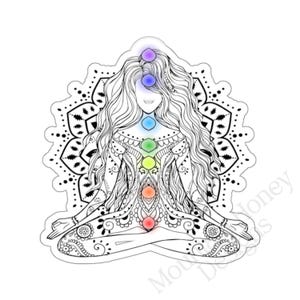 May include: A black and white line drawing of a woman in a yoga pose with a mandala behind her. The woman has seven chakras represented by colored circles along her spine. The chakras are purple, indigo, blue, green, yellow, orange, and red.