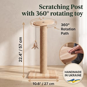 May include: A scratching post with a 360-degree rotating toy, featuring a light wood base and top, a sisal-wrapped column, and a hanging feather toy. It measures 22.4 inches in height and 10.6 inches in width. Text includes "Scratching Post with 360&deg; rotating toy" and "HANDMADE IN UKRAINE".