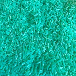 Colored Rice sensory bin filler creative play Green