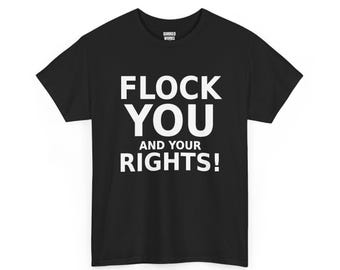 May include: A black short-sleeved t-shirt featuring the white text FLOCK YOU AND YOUR RIGHTS! printed on the chest. The inner neck label displays the text QUIRKED WORKS in white on a black background. The shirt has a crew neckline.