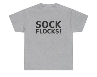 May include: A heather grey short-sleeve t-shirt featuring the text SOCK FLOCKS! printed in bold black capital letters across the centre of the chest. The garment has a standard crew neckline and a straight hemline at the bottom.