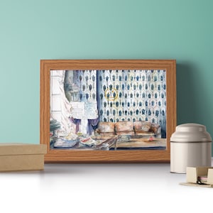 May include: A framed watercolor painting of a room with a patterned wall and a couch. The painting is on a white surface with a brown box and a silver container.