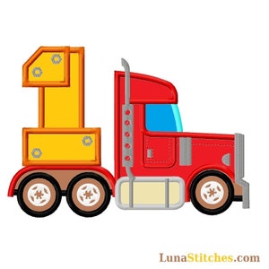 May include: A yellow number one shaped like a construction crane is attached to a red toy semi-truck. The truck has a blue windshield and brown wheels.