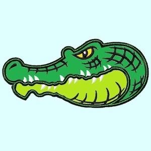 May include: Green alligator head with a yellow eye and sharp teeth. The alligator's mouth is open and the teeth are visible. The alligator's head is outlined in black.