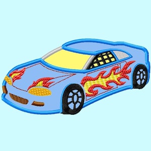May include: A blue race car with yellow and red flames on the side. The car has a black grill and black wheels.