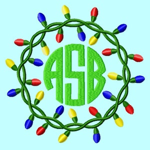 May include: A green circle with the letters "ASB" in white inside. The circle is surrounded by a wreath of green vines with red, blue, and yellow light bulbs.