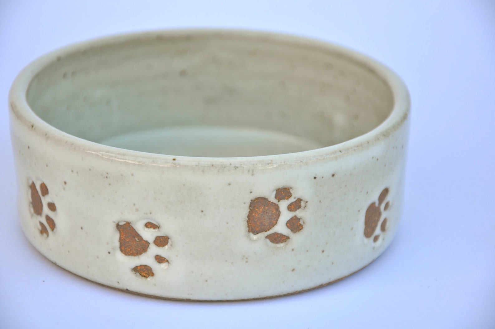 Small ceramic dog bowl with paw prints white pottery dog Etsy