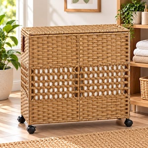 May include: A rectangular laundry hamper constructed from light brown woven wicker material. The hamper features a hinged lid, a white fabric liner visible through the weave, and four black swivel casters attached to the base for mobility.