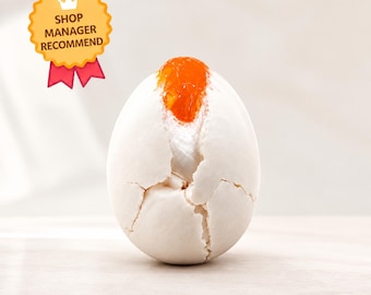 Bola sensorial macia e crocante de ovo que estoura, com textura de argila.