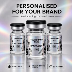 Könnte beinhalten: Drei klare Glasfläschchen mit schwarzen Verschlüssen und holografischen Etiketten mit dem Text YOUR BRAND HERE, BAC WATER und 10ML. Die Etiketten zeigen schwarze Grafiken von DNA-Strängen und Zellen. Text: PERSONALISED FOR YOUR BRAND.