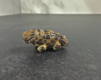 Scultura di Simosuchus paffuto