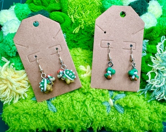 Graziosi orecchini Minowser e Mishi