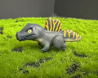 Scultura di spinosauro JWR