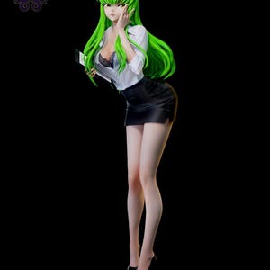 May include: A standing anime-style figurine of a character with long, vibrant green hair, wearing a white button-down shirt, a black lace-trimmed camisole, and a short black skirt. The figure holds a small black folder and wears black high heels.