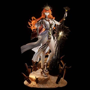 May include: A detailed anime-style figurine of a character with long orange hair, wearing a white and gold outfit with a sun-shaped headpiece. The figure holds a large, dark, textured sword and stands on a rocky base surrounded by smaller blades.