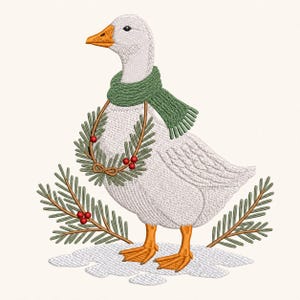 May include: An embroidery design of a white goose with an orange beak and feet, wearing a textured green scarf. The goose is adorned with a wreath of pine needles and red berries around its neck, standing on a patch of white snow with pine branches.