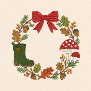 May include: An embroidered wreath design featuring a red bow at the top, a green rain boot on the left, and a red and white spotted mushroom on the right. The circular arrangement includes brown acorns, orange berries, and green and brown oak leaves.