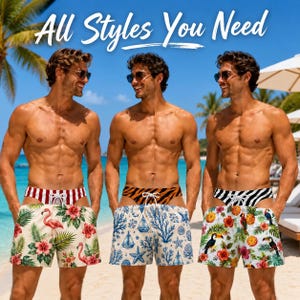 May include: Three sets of swim trunks with white waistbands featuring red stripes, tiger print, and black stripes. The trunks display patterns of pink flamingos, blue nautical motifs, and tropical toucans with hibiscus flowers.