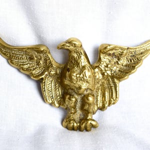 Huge brass belt buckleEnglish buckle..eagle shaped buckle...large bald eagle belt buckle...England. image 1