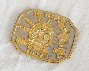 Boucle de ceinture 100 ans de liberté 1884-1984 Boucle en métal massif 1984 - France