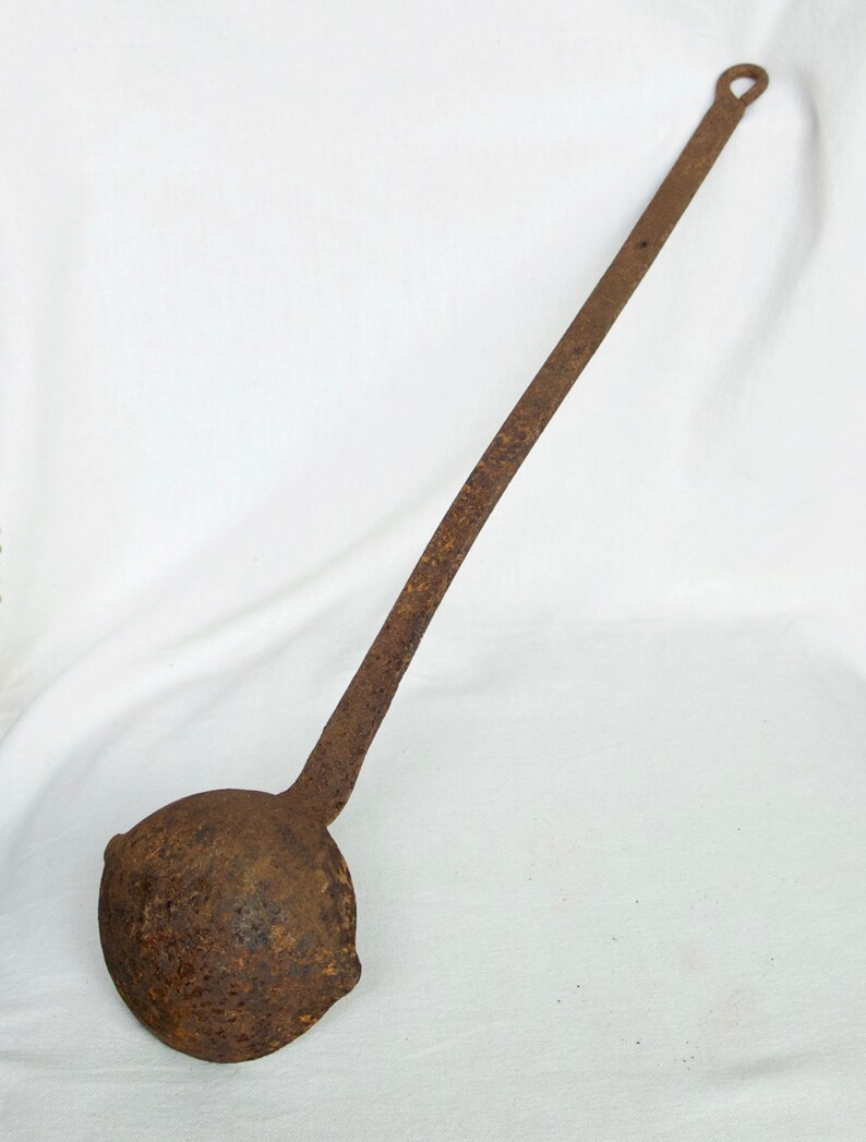 Vintage cast iron ladle...large ladle...rusty ladle. Etsy