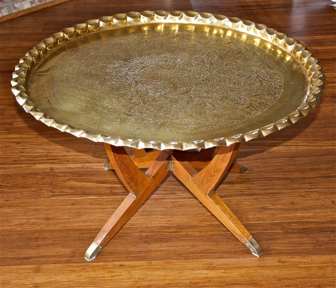 Vintage brass top table with folding wooden legs...30 inches Etsy