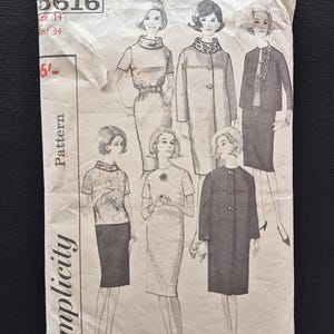 May include: A vintage Simplicity sewing pattern envelope, number 5616, size 14, bust 34. The paper envelope features black and white illustrations of six different outfits, including dresses, coats, and skirts, with visible creases and aged paper texture.