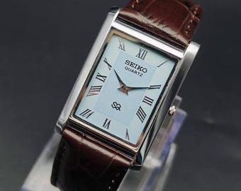 Reloj de pulsera vintage Seiko Slim Tank Style de cuarzo para hombre, de acero inoxidable, restaurado.