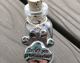You Left Pawprints On My Heart keepsake glass vial for lock of pet hair