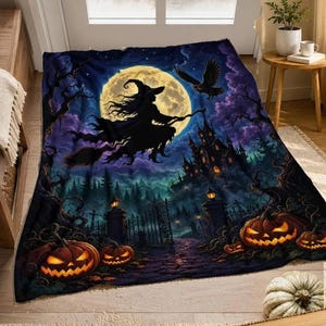 May include: A rectangular throw blanket featuring a dark, atmospheric Halloween scene. A silhouette of a witch on a broomstick flies before a large, glowing yellow full moon. Below, a spooky castle, a forest, and carved jack-o'-lanterns.