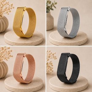 May include: A collection of four metal mesh watch bands in gold, silver, rose gold, and black. Each band features a fine woven texture and a rectangular metal clasp mechanism, presented as individual circular loops on a neutral surface.
