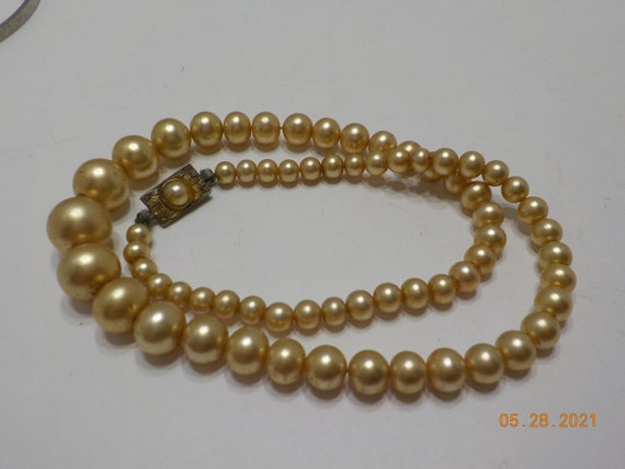 Vintage faux pearls: 125,700 ppm Lead. 90 ppm is unsafe. Please