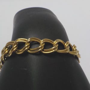 Bracciale vintage Monet a doppia maglia color oro (6522) con chiusura a moschettone