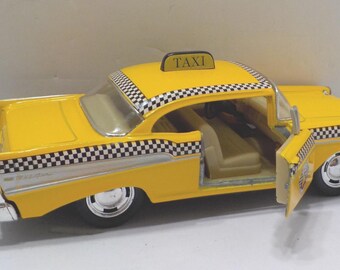 Vintage Kinsmart 1957 Chevrolet Bel Air (16-1) Taxi--1/40 Scale