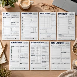 May include: A set of seven white paper planner sheets with black text and grid layouts. The sheets include an ADHD daily planner, weekly planner, monthly overview, brain dump, task breakdown, habit and self-care tracker, and notes and reflection page.