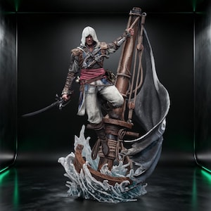 May include: A detailed figurine of a hooded character in a brown leather jacket, white trousers, and a red sash, standing on a wooden ship mast surrounded by sculpted blue water waves. The character holds a curved sword and grips a rope on the mast.