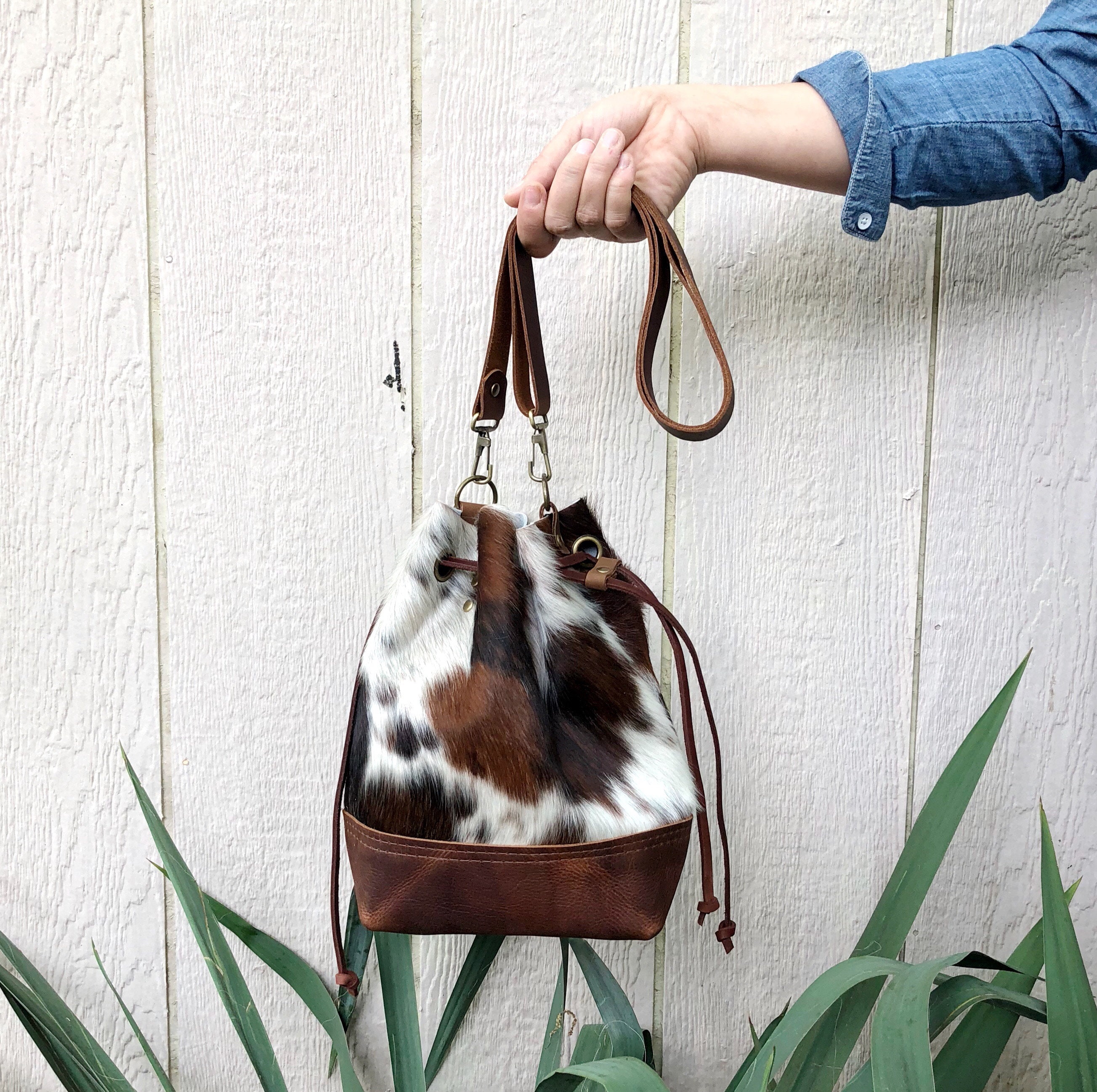 Cowhide bucket outlet bag