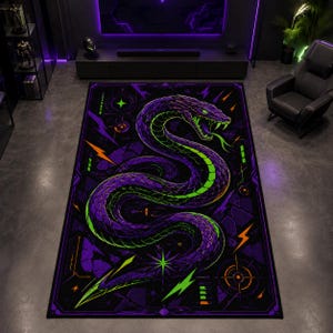 May include: A rectangular area rug featuring a large, coiled snake with purple scales and a bright green underbelly. The design includes neon green and orange lightning bolt accents, geometric shapes, and circular target motifs on a dark background.