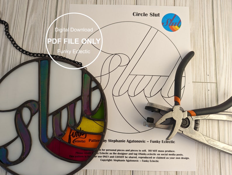 May include: A digital download PDF file for a stained glass pattern of the word "Slut" in a circle. The pattern is in black and white and includes a small circle with the word "Slut" in rainbow colors. The image also shows a finished stained glass piece and tools for making stained glass.