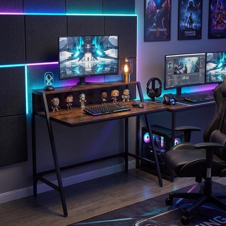 May include: A dark wood gaming desk with a hutch, featuring a computer monitor, a mechanical keyboard, a computer mouse, and several small character figurines. The desk has a black metal frame and is illuminated by blue LED strip lighting.