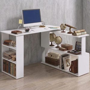 May include: A white L-shaped desk with integrated shelving units. The desk surface holds a computer monitor, a small clock, and a cup. The shelves contain books, globes, wooden boxes, a telescope, rolled maps, an art supply case, and a brown bag.