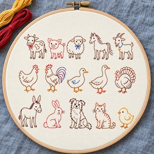 May include: A round wooden embroidery hoop containing white fabric with hand-stitched outlines of various farm animals including a cow, pig, sheep, horse, goat, chicken, rooster, duck, goose, turkey, donkey, rabbit, dog, cat, and a small chick.