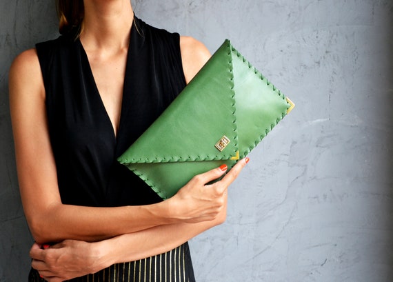 green leather clutch